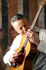 Guitar Man Travels Endless Road